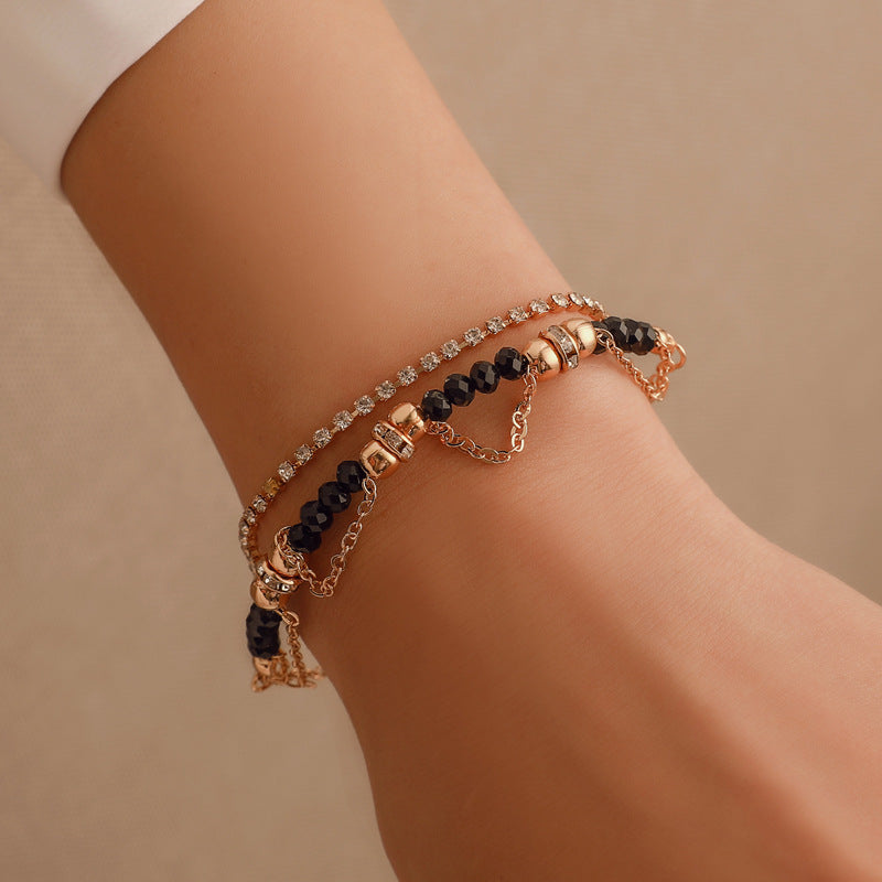 Gold-Plated Bracelet with Black Beads