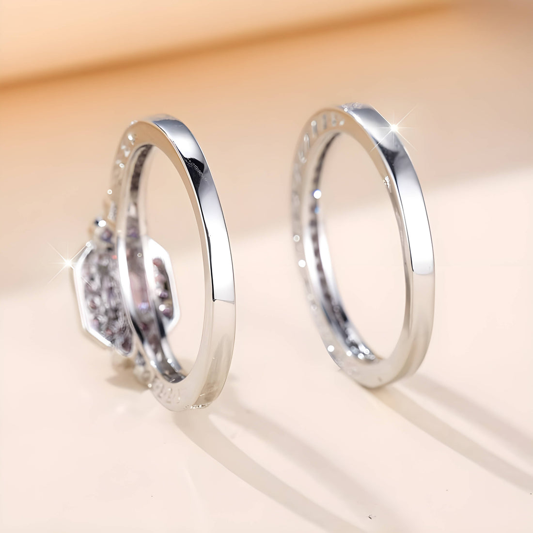 Back view of two sleek promise rings for women, showcasing their smooth, polished bands. 