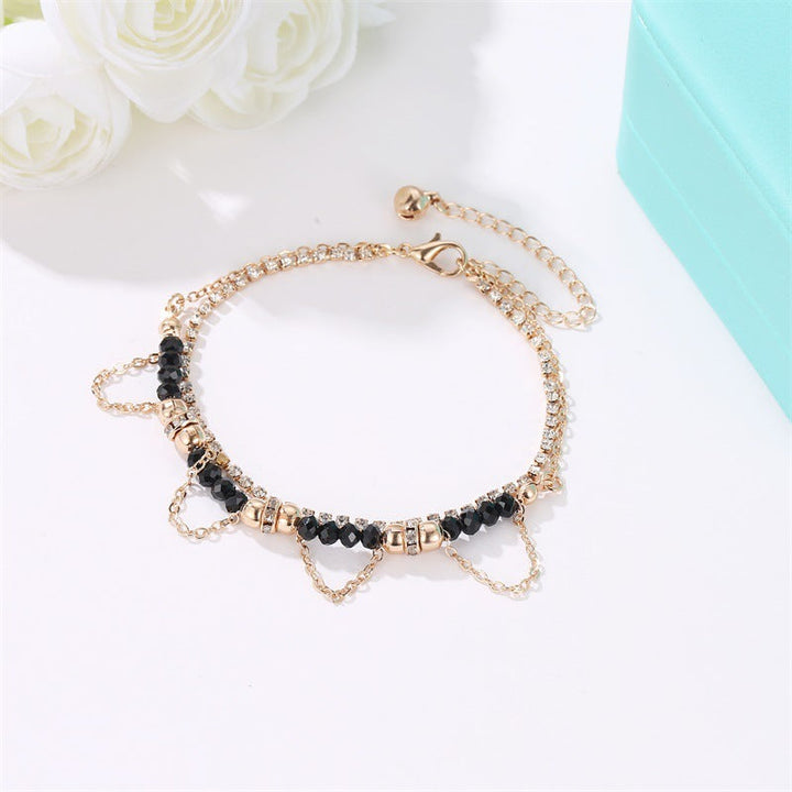 Gold-Plated Bracelet with Black Beads