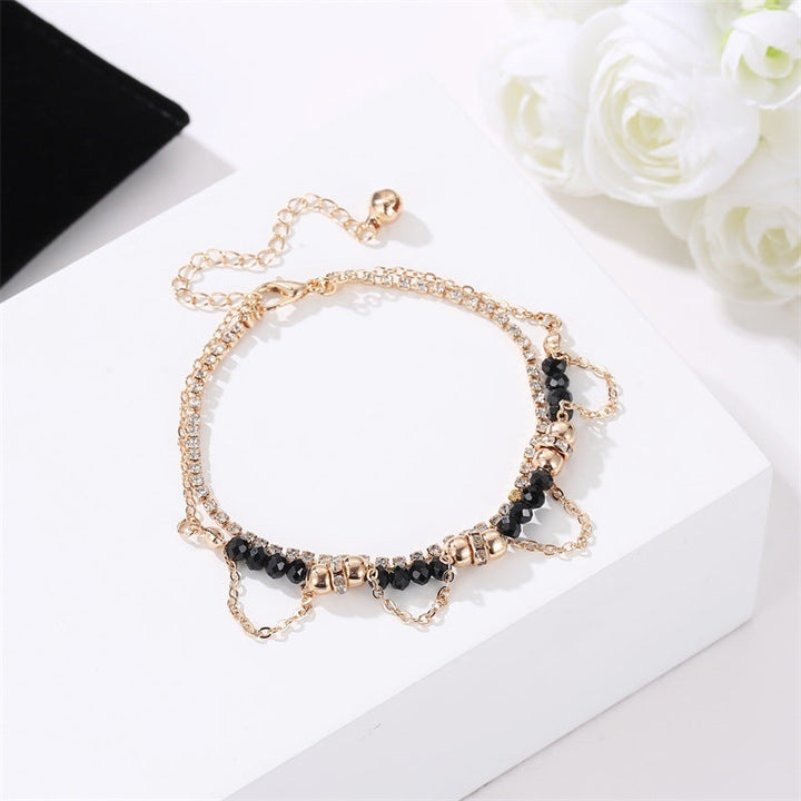 Gold-Plated Bracelet with Black Beads