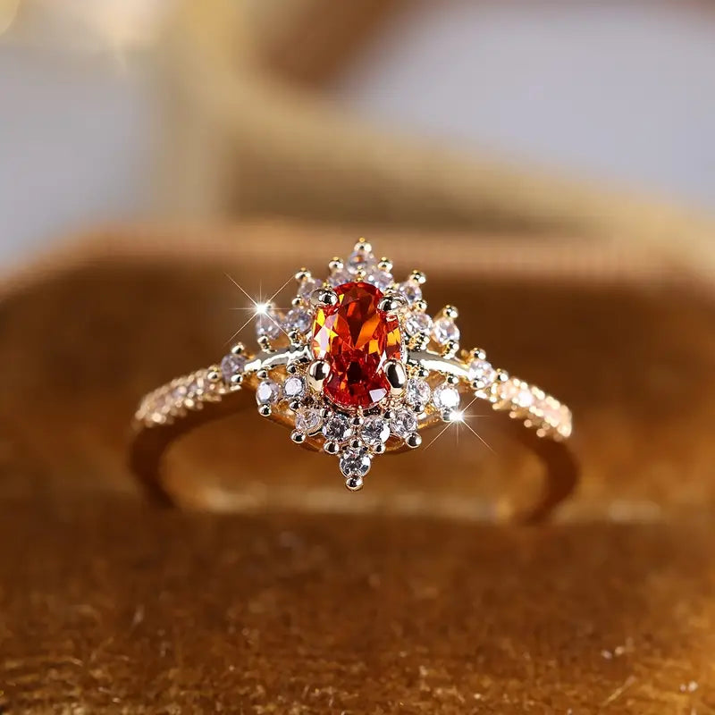 Elegant 18K Gold-Plated Ring with Orange Gemstone and Cubic Zirconia